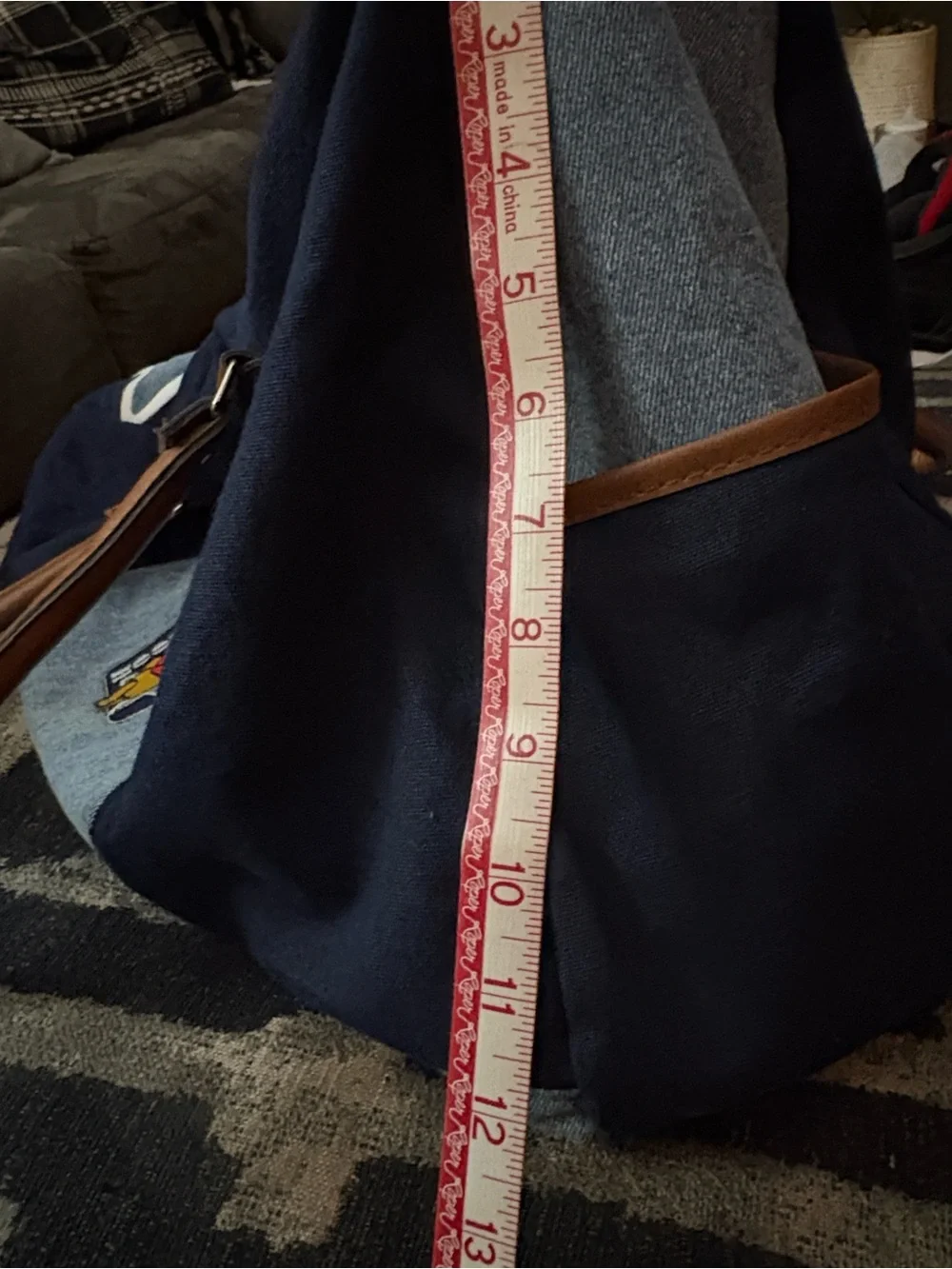 Disney Navy Sling Bag with Winnie the Pooh Print and Red Accent